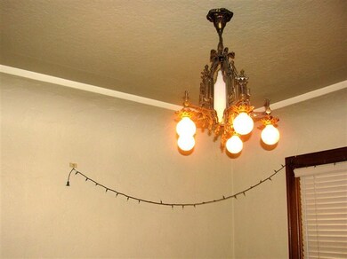 A beautiful antique chandelier at the Dining Room.