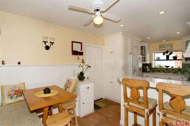 Informal dining and breakfast bar in kitchen