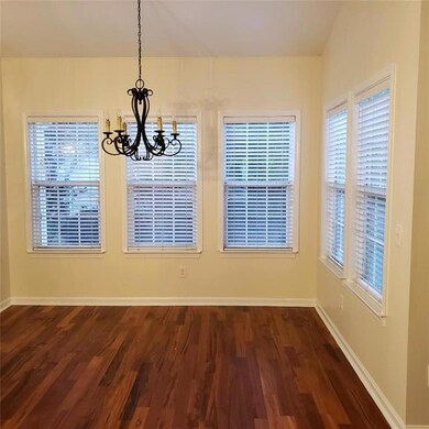 Bright and light Breakfast Nook with door to screened porch