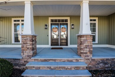 Property entrance featuring a porch and french doo