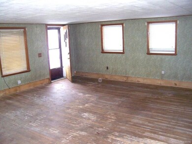 Living Room/Dining Area With Entry Door, Hardwood 