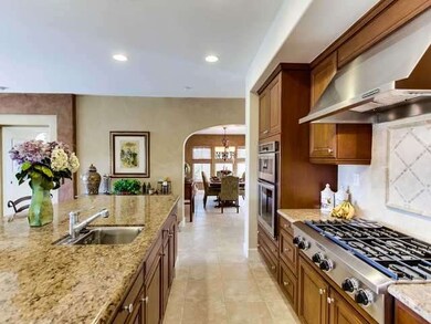 Stainless steel Kitchen Aid appliances, including 