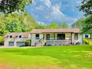 View of front of home with covered porch, a front 