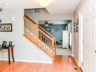 Beautiful hard wood floors welcome you into the op