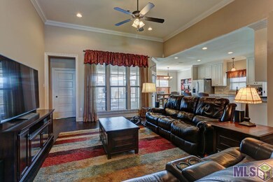 Huge open area living area. Opens to kitchen, dini
