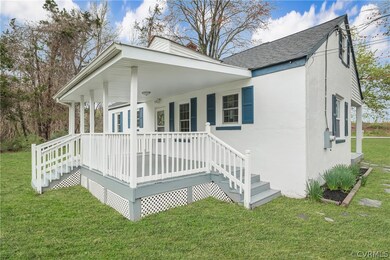 View of front of home featuring covered porch and