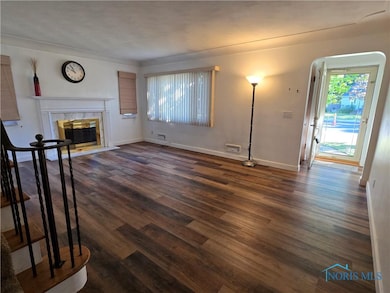 Living room, looking toward entryway