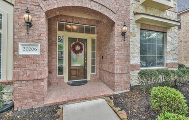 Sidelight windows and leaded glass door welcome you and your guests, while bringing in lots of natural light