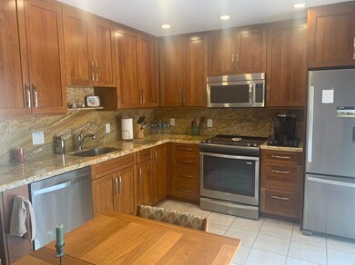 UPGRADED KITCHEN WITH STAINLESS STEEL APPLIANCES.