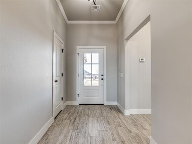 Large entry w/ soft light from outside.