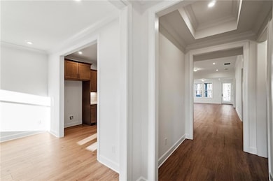 Hallway featuring light hardwood / wood-style floo