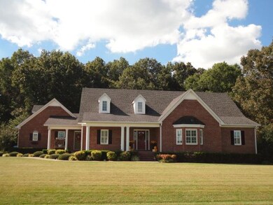 325 Mitchell Lane, Manchester, TN   Beautiful home throughout the entire home. Quality in every room and even under the home with steel trusses under the home for extra durability. This home is hard to top! Home also has a Salt water swimming pool!