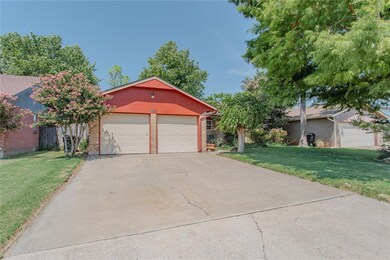 View of front of home featuring a garage and a fro