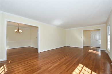 Living room looking into DR and Front entry