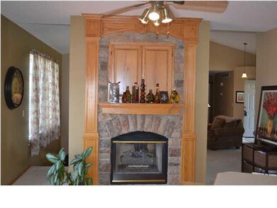 Hearth kitchen with two way fireplace.