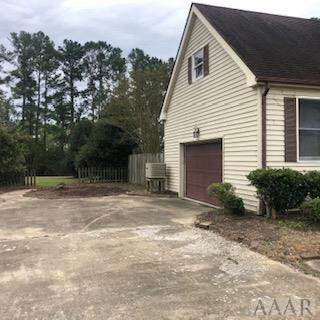 Concrete drive to the garage.
