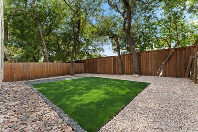 View of fenced backyard