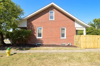 View of home's exterior featuring brick siding
