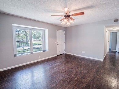 Family Room with Box Window with Granite Sill.