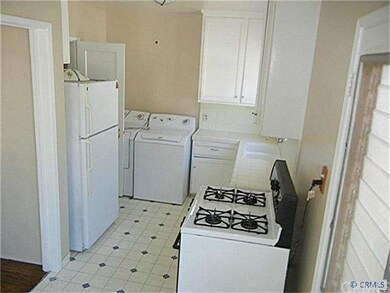 Freshly Painted Kitchen Has Inside Laundry.