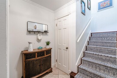 Stairway featuring tile patterned flooring and cr