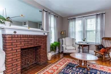 Living room with brick fireplace