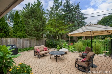 Gorgeous paver brick patio with beautiful perennia