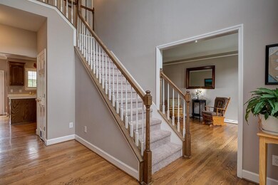 From the front entrance, you are connected to office/formal living and dining which continues onto the kitchen.   Heavy crown molding through out the house.
