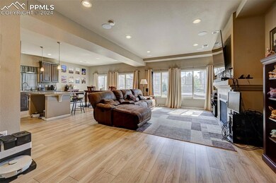Living room with light wood-type flooring