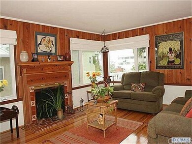 original floors and wall panel throughout
