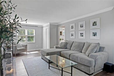 All new flooring, freshly painted a light gray and