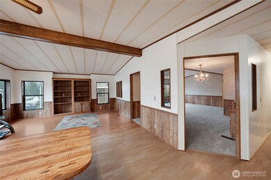 Next to the dining area, you walk into a large open Kitchen and Family Room.