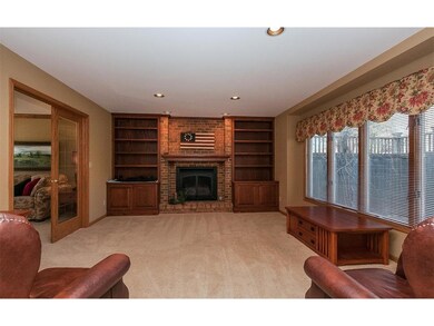 Family room with windows overlooking gorgeous yard