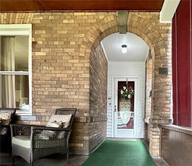 Front door is recessed back and offers protection