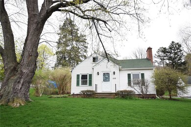 Large yard with mature trees and plantings