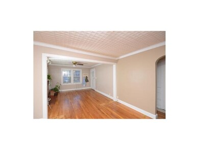 Dining/family room is complete with arch doorways.