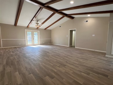 Living room looking toward hallway, back door is on the left.