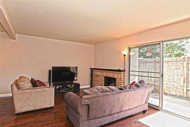 ANOTHER VIEW OF THE COMFORTABLE/COZY LIVING ROOM