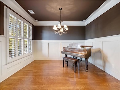 Formal dining room featuring light hardwood / wood