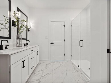 Primary bath with matte black accents
