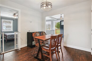 Dining Area Looking into Kitchen & Second Bedroom