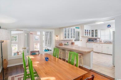 Dining space with a healthy amount of sunlight and