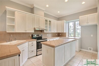 Well designed Kitchen with upgrades including cabi