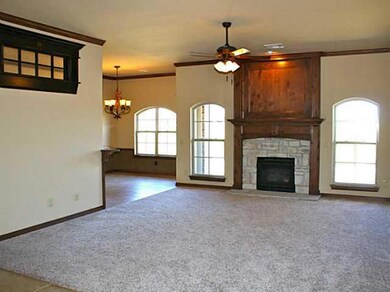 Living Room. Wood floor in study with transoms ove