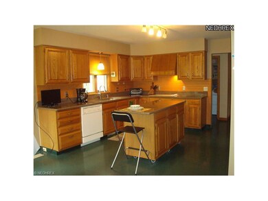 large kitchen has newer quartz countertops; newer 