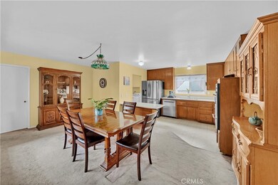 Large Dining Room Is Adjacent To The Kitchen For Easy Access