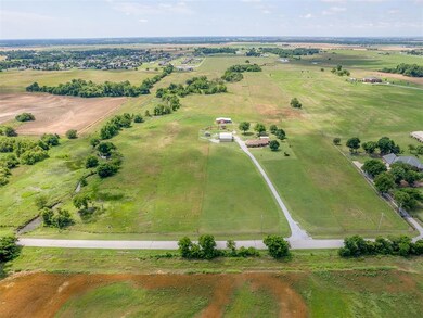 Aerial view of property's location with rural landscape