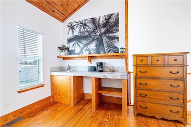 Upstairs primary with en suite lav and breakfast b