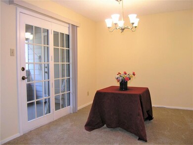 DINING AREA WITH ATRIUM DOORS TO PATIO.  NICE VERT