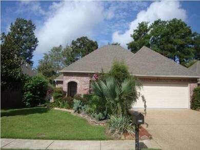 DOUBLE CAR GARAGE AND LUSH LANDSCAPING